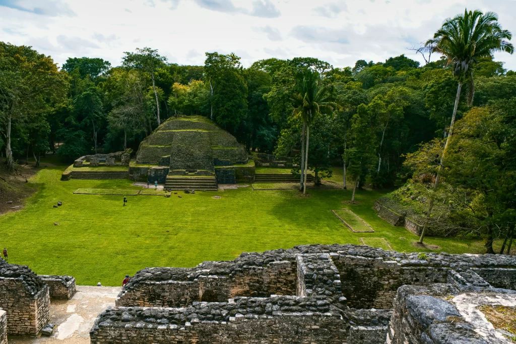 The ancient Mayan stone structures of Caracol stand against a verdant jungle in Belize.