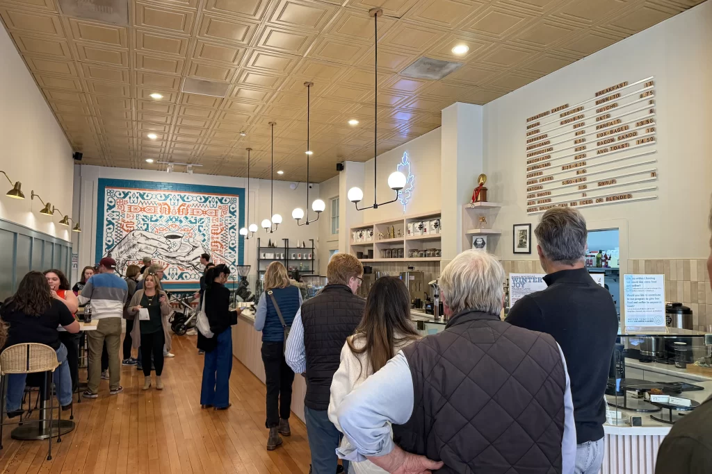 Patrons stand in line at Black Oak Coffee Roasters in Healdsburg, California.