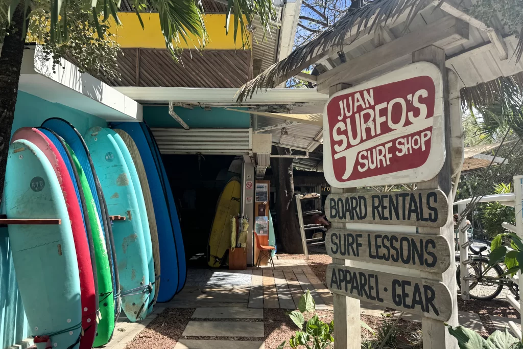 Surfboards line the entryway to Juan Surfo's Surf Shop in Guiones, Costa Rica. Surfing is one of the most popular things to do in Nosara.