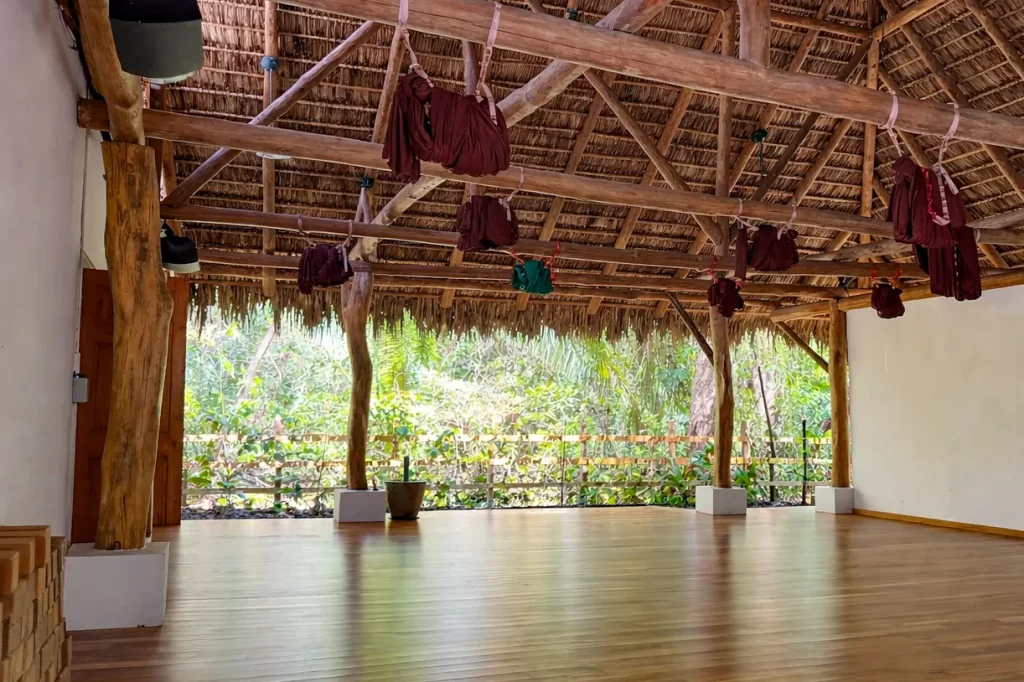 A tropical open-air yoga studio at Harmony Hotel near Nosara, Costa Rica. Harmony is one of the more popular Nosara yoga studios.