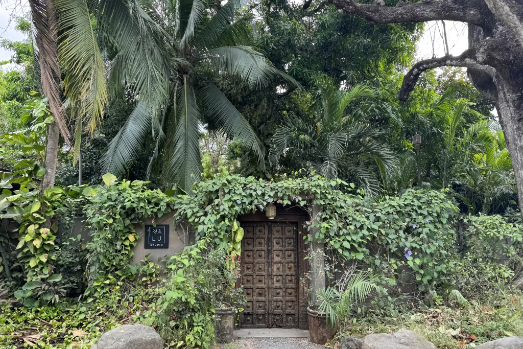 The lush jungle exterior of Nalu Studio in Guiones, Costa Rica. Nalu provides a pleasant alternative to the more crowded Nosara yoga classes.