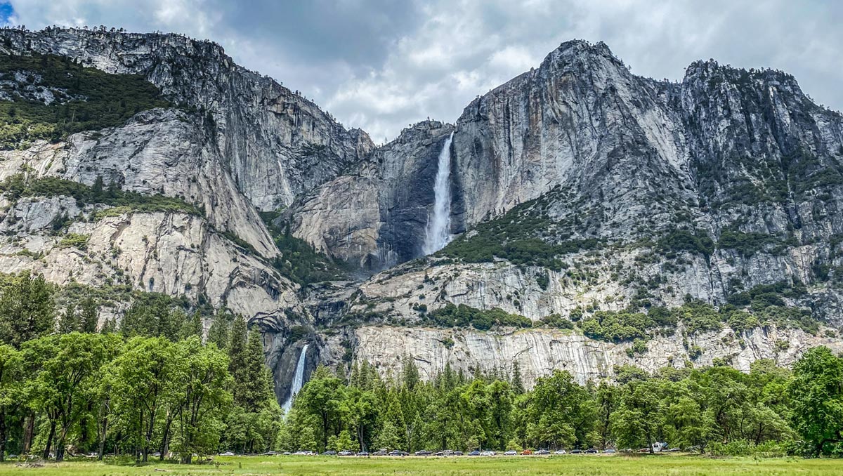 Upper and Lower Yosemite Falls thunder with late spring snow melt, as seen from Yosemite Valley.