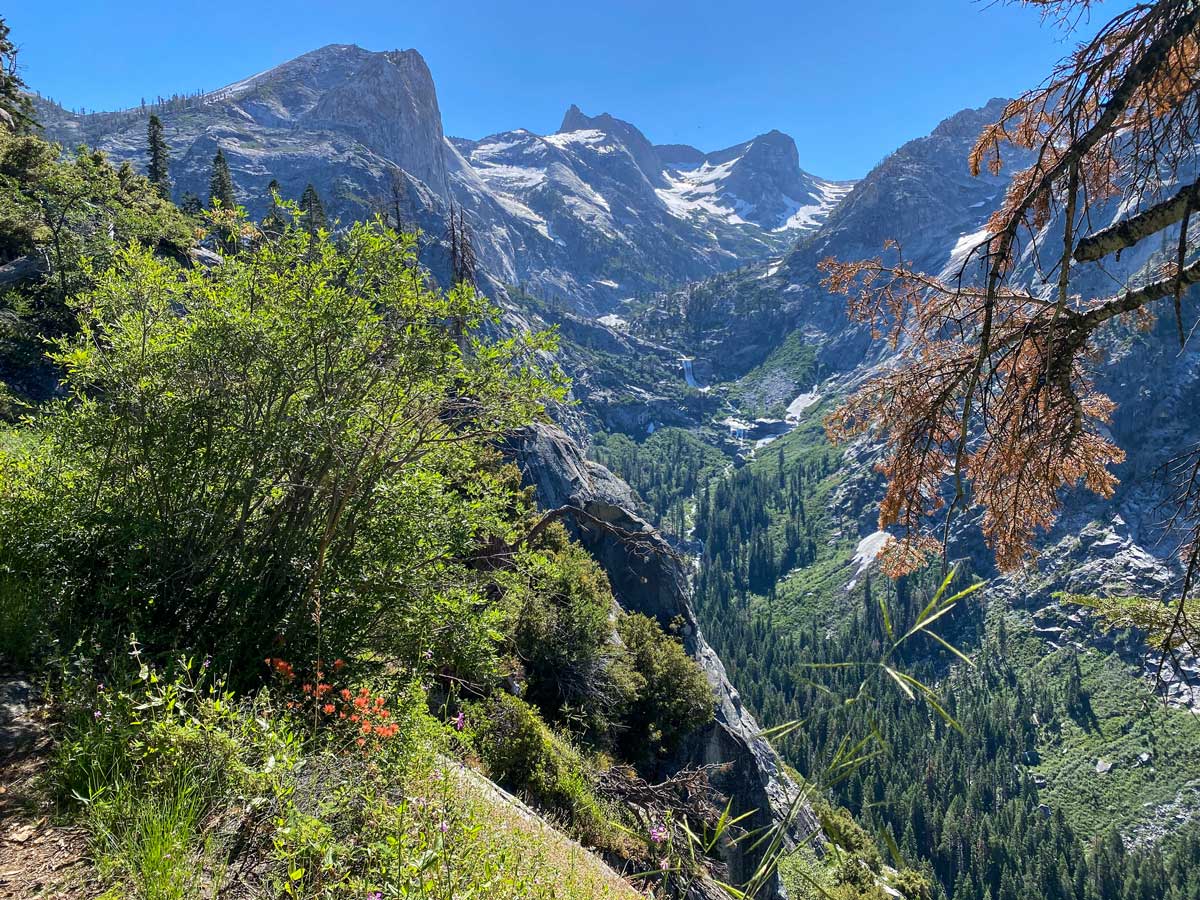 A high alpine valley looks out to Hamilton Creek, surrounded by tall peaks along the High Sierra Trail.