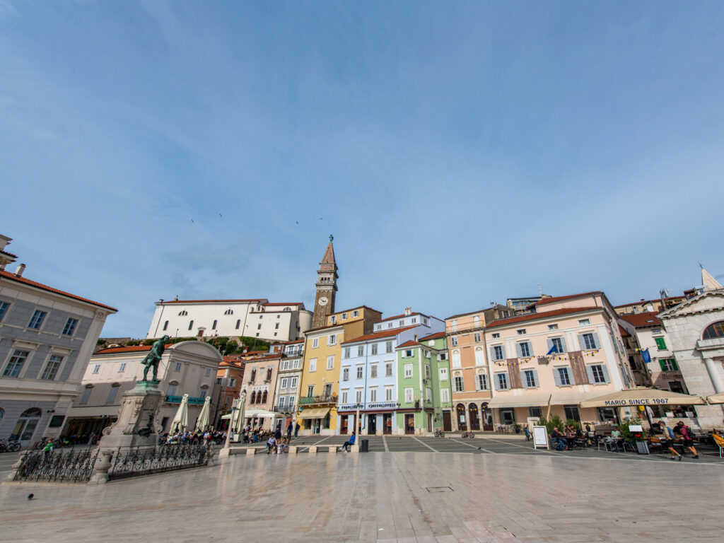 Colorful facades line Tartini Square in Piran, Slovenia.