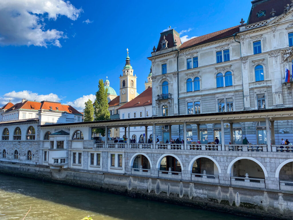 Tables along the Central Market line the riverfront in Ljubljana, Slovenia.