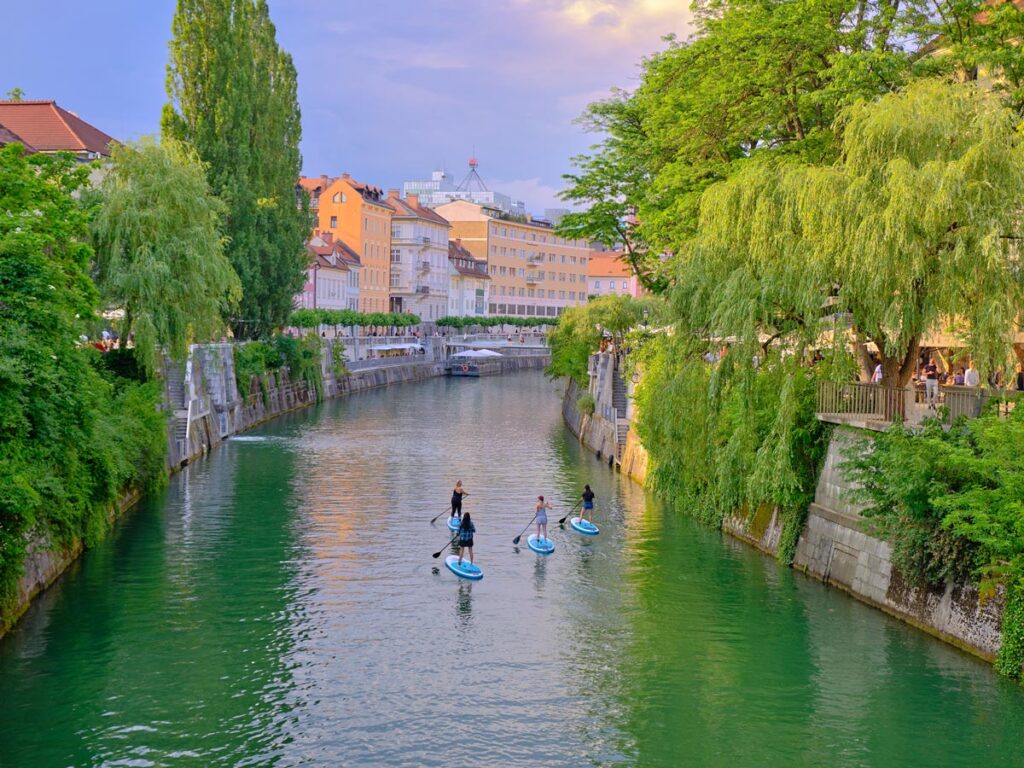 Paddle boards glide along the Ljubljanica River in Ljubljana, Slovenia.