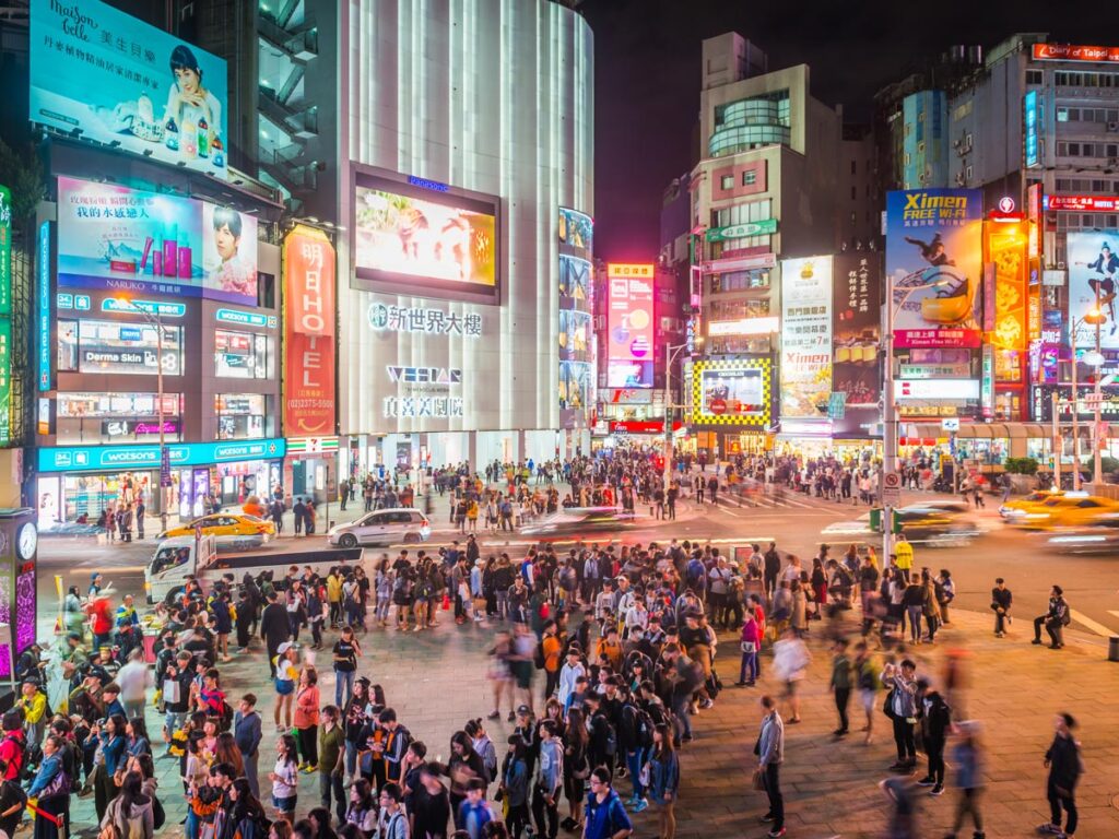 Pedestrians crowd the Ximending District of Taipei, Taiwan.