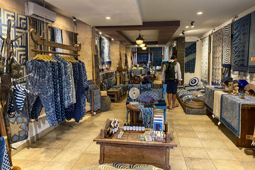 A lone shopper peruses the bright blue textiles displayed at Itak Batik store in Ubud, Bali. 