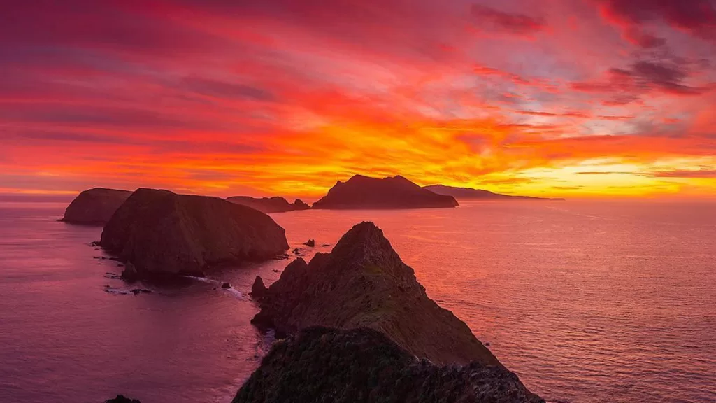 A vivid sunset illuminates Inspiration Point on Anacapa island, in Channel Islands National Park