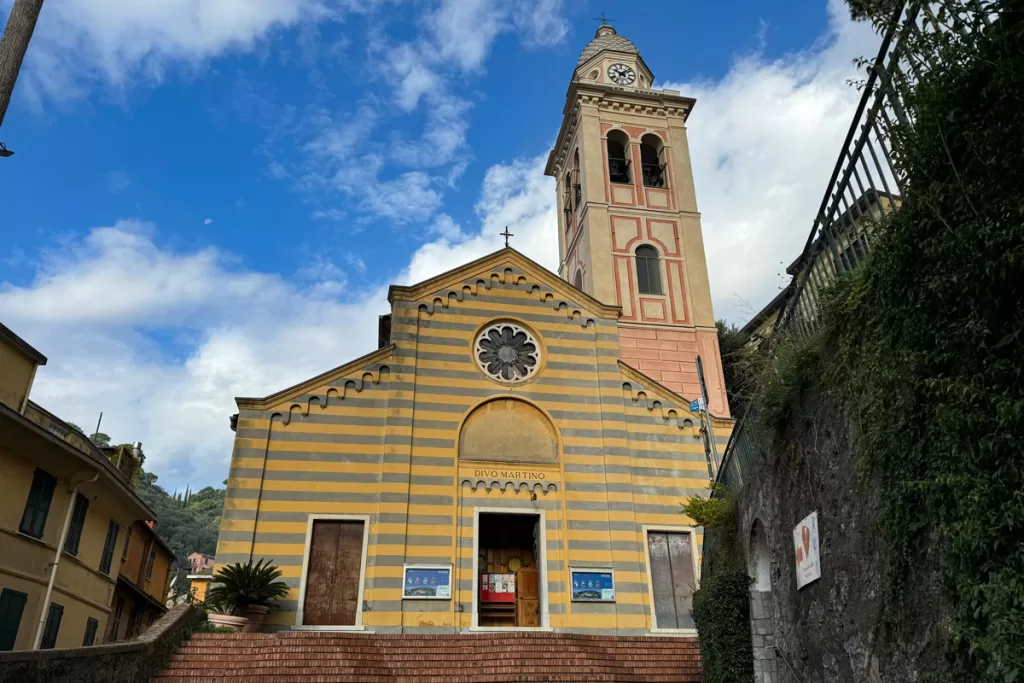 The brightly-painted little Chiesa di San Martino, or Church of St. Martin, stands tall in Portofino, Italy.