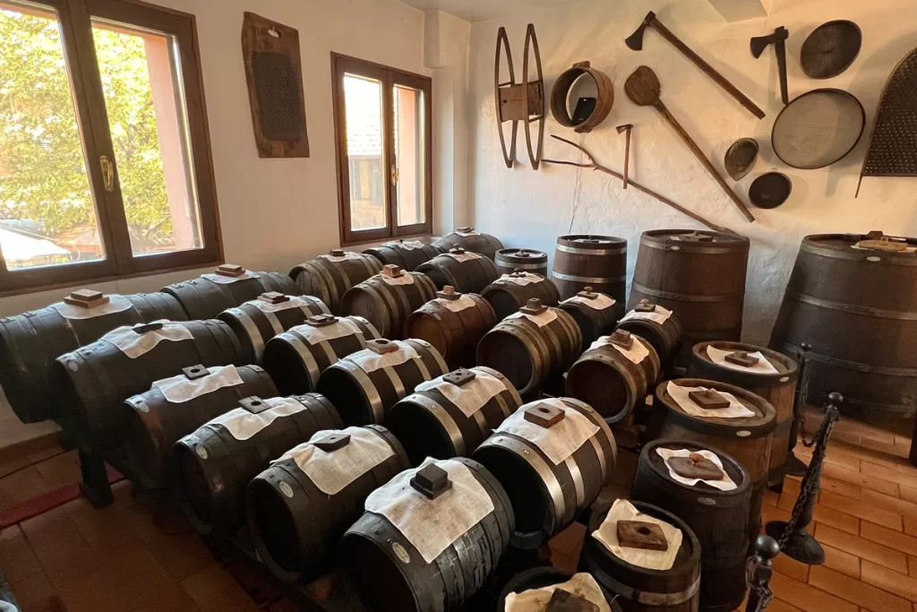 Barrels of balsamic vinegar age in a traditional storeroom near Modena, Italy.