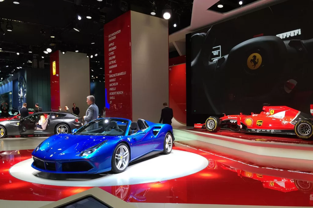 A bright blue convertible is displayed in a showroom at the Ferrari Museum near Modena, Italy.