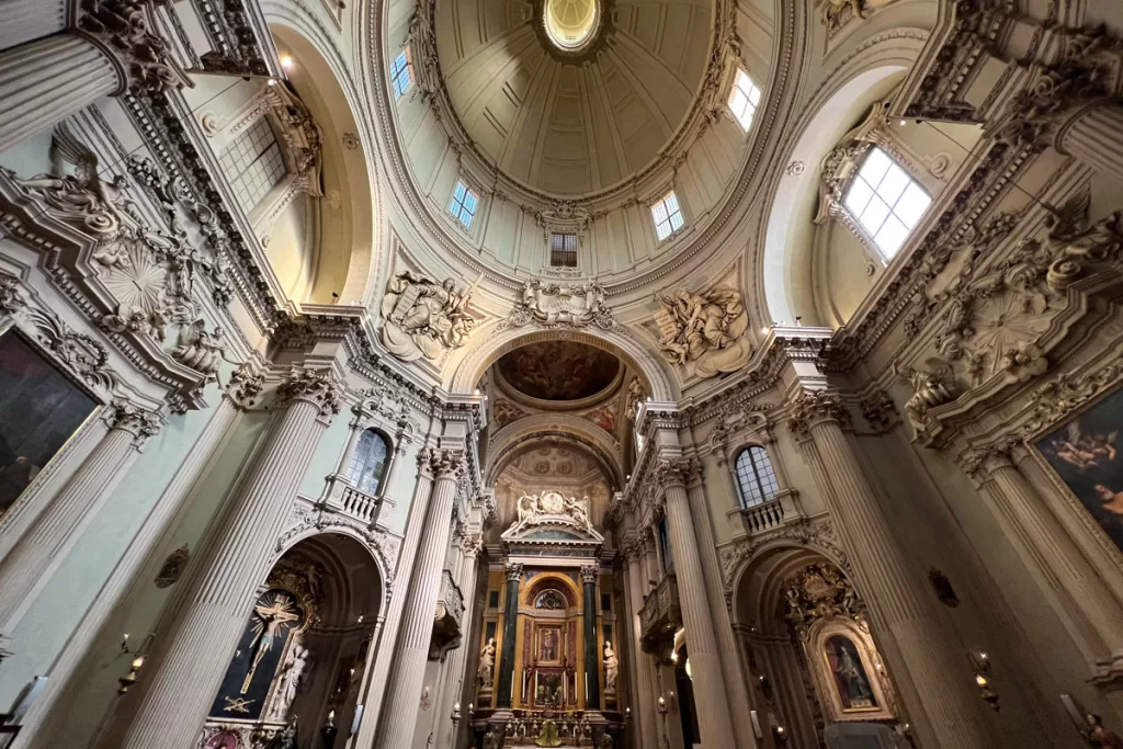 A fish eye lens capture of Santa Maria della Salute, a small, Baroque neighborhood church in Bologna, Italy.
