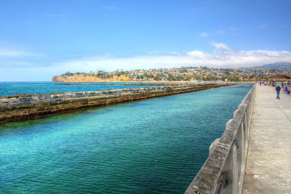 A breakwater stretches along Cabrillo Beach in San Pedro, California.