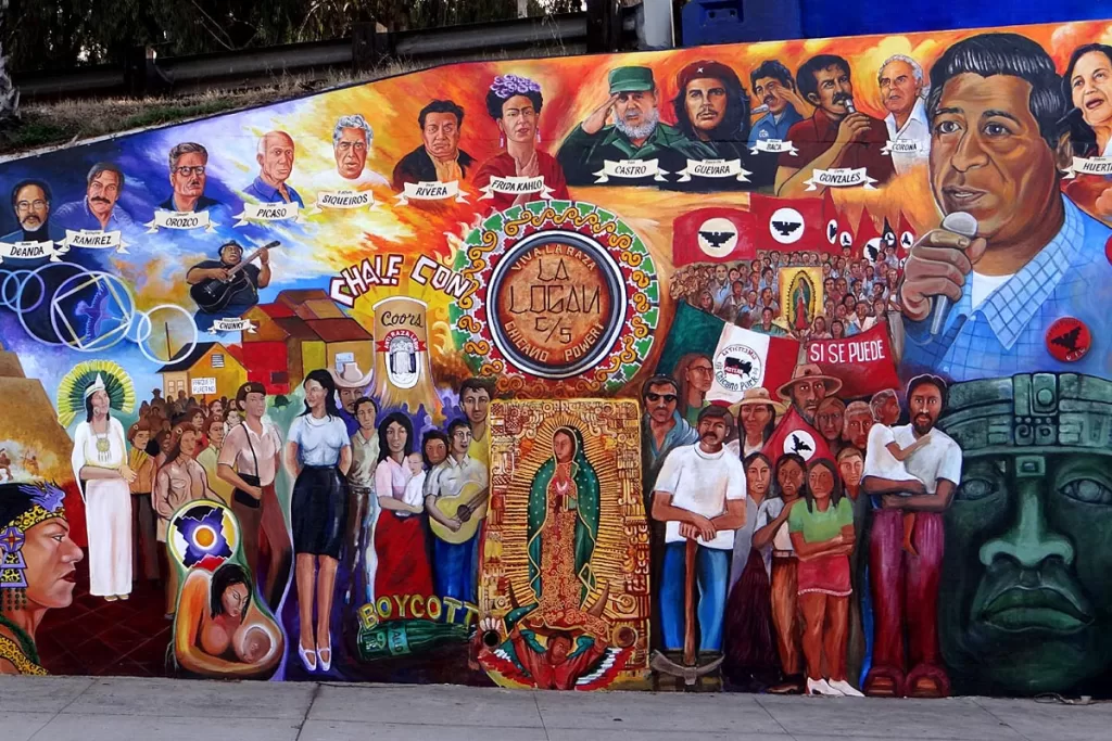 A vibrant mural highlighting Mexican American decorates a wall in San Diego's Barrio Logan neighborhood.